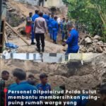 Personil Ditpolairud Polda Sulut Gerak Cepat Evakuasi Material Rumah Warga Roboh Pasca Gempa Bumi